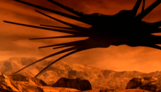 An iridescent sci-fi spider-like ship hovering over the surface of Mars. (It's actually a Shadow vessel, from Babylon 5.)